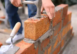 mason building bricks