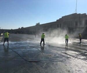 Parking lot pressure washing by West Coast Property Maintenance