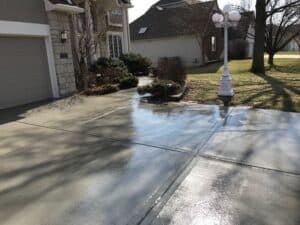 A sealed concrete driveway by Rock Solid Seal