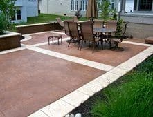 A stained concrete patio by Texas Patios